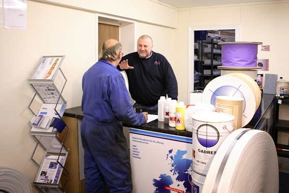 Picture of customer buying pipe lining materials